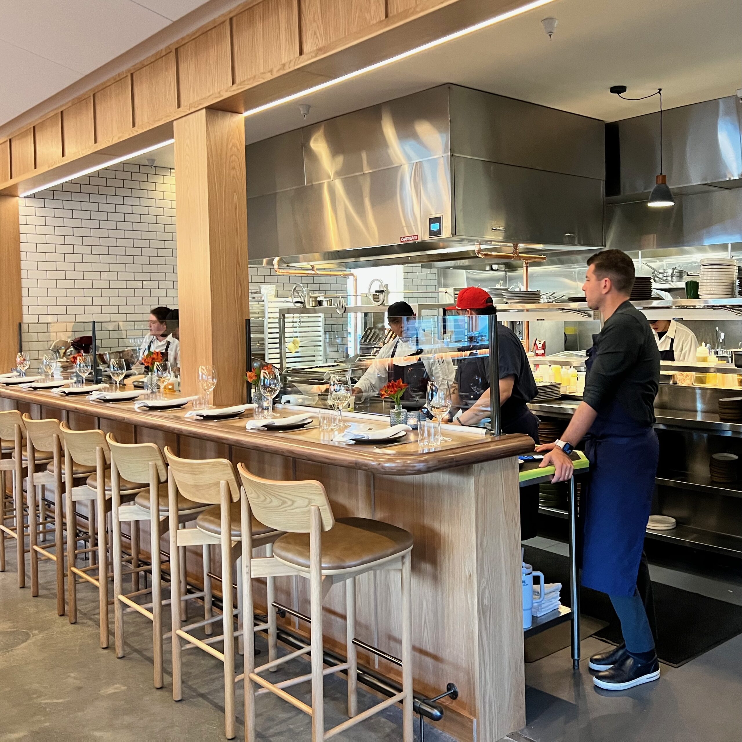Chefs in open kitchen